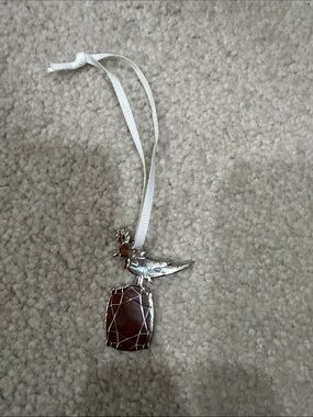 Tiffany& Co Silver Bird Pendant with Brown Stone Accent